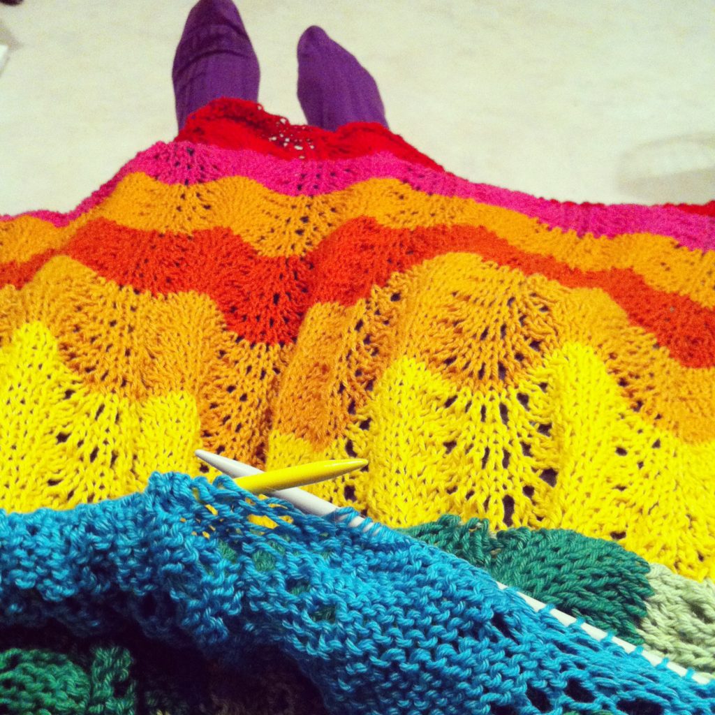 I knit myself a rainbow superhero blanket